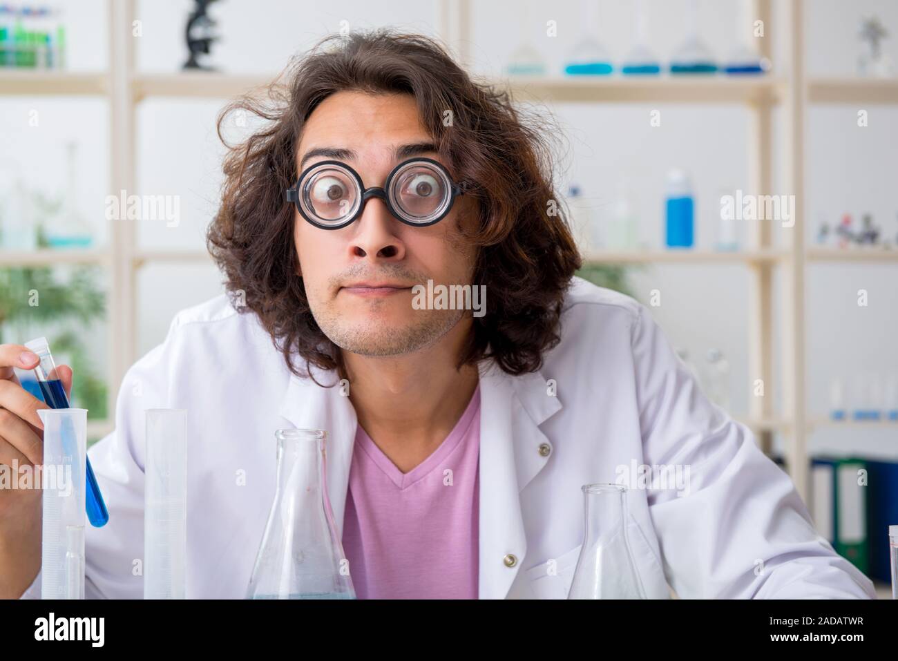 Funny male chemist working in the lab Stock Photo