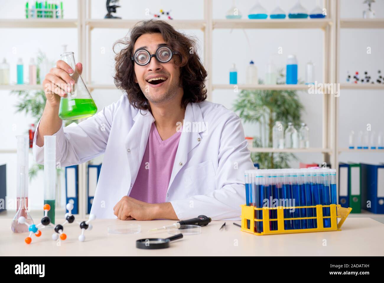 Funny male chemist working in the lab Stock Photo