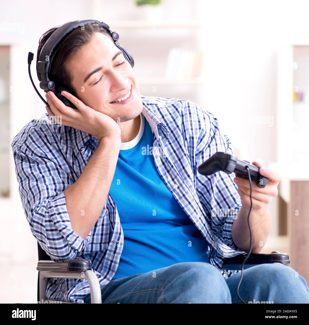 Disabled man playing computer games during rehabilitation Stock Photo Alamy