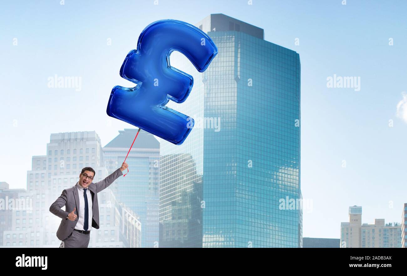 The businessman flying on british pound sign inflatable balloon Stock ...