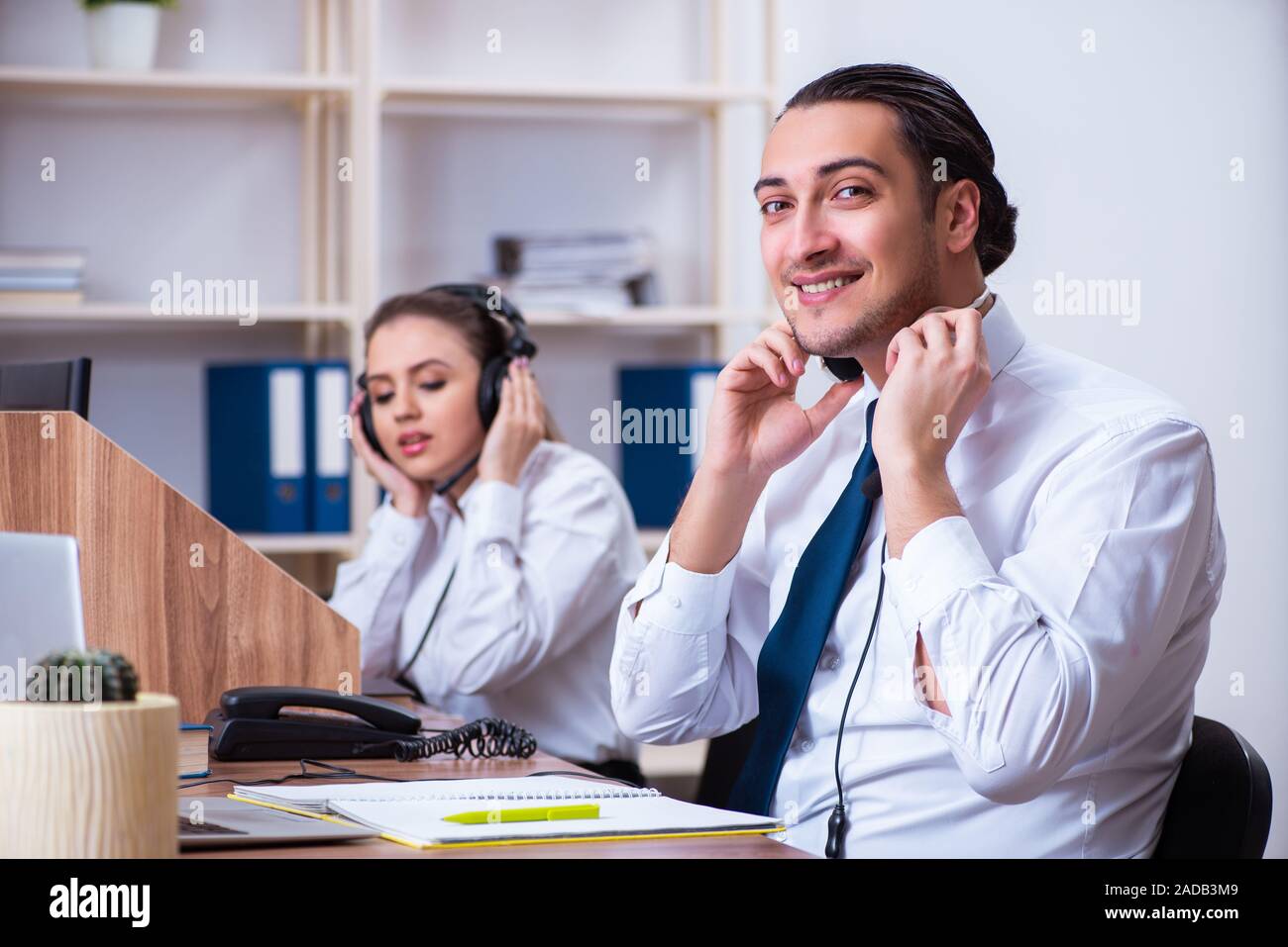 Call center operators working in the office Stock Photo - Alamy