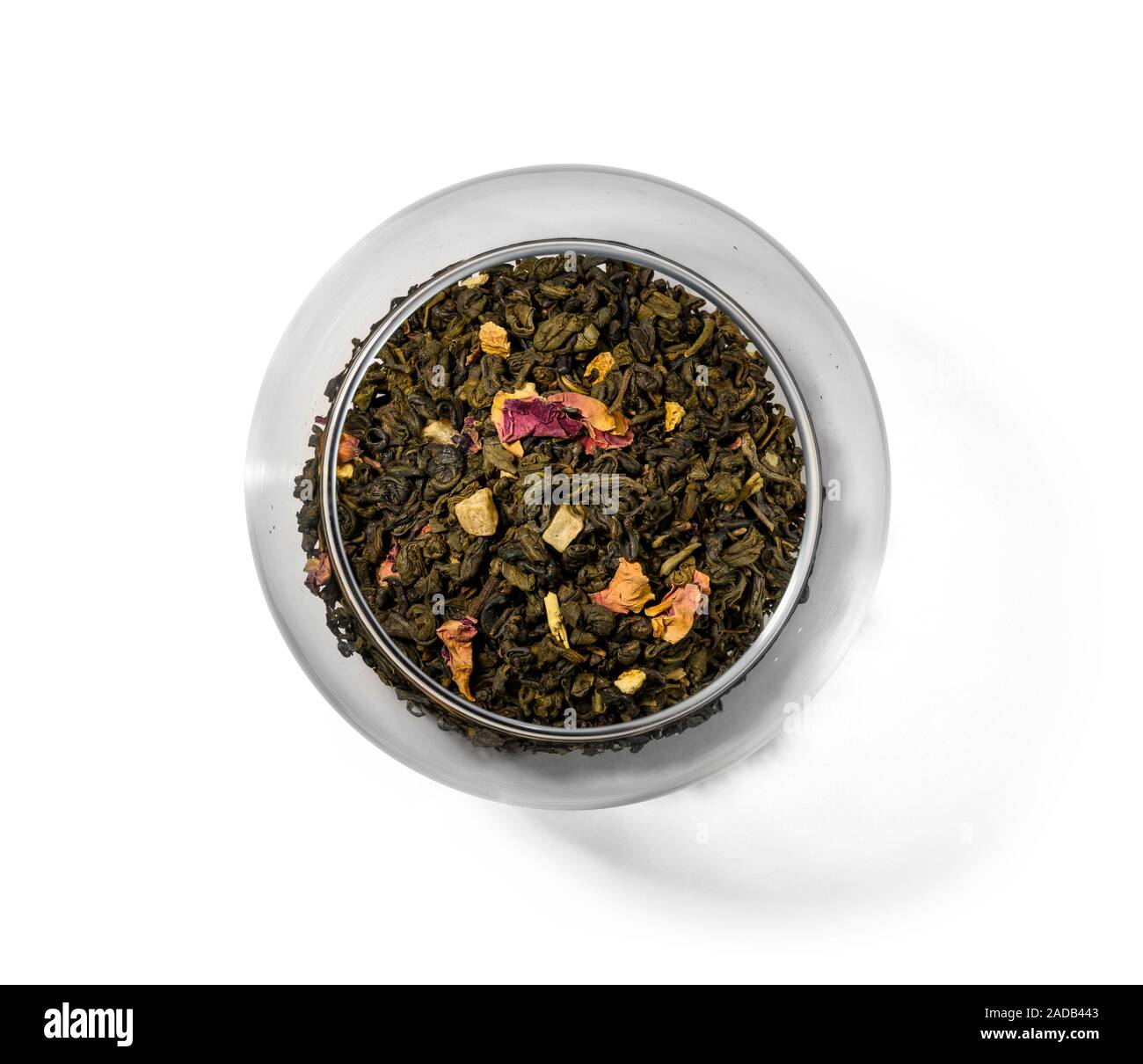Green tea with aromatic additives. Top view on white background Stock ...