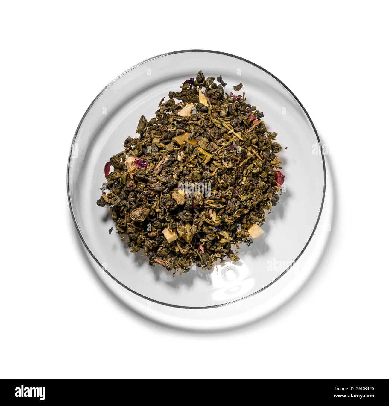Green tea with aromatic additives. Top view on white background Stock ...