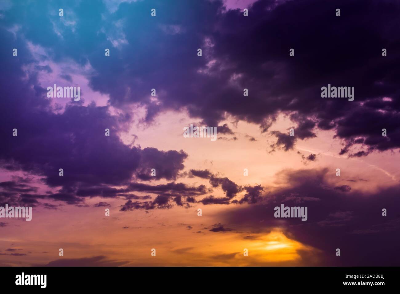 Beautiful cloudscape with colorful contrasting clouds at sunset. natural background Stock Photo