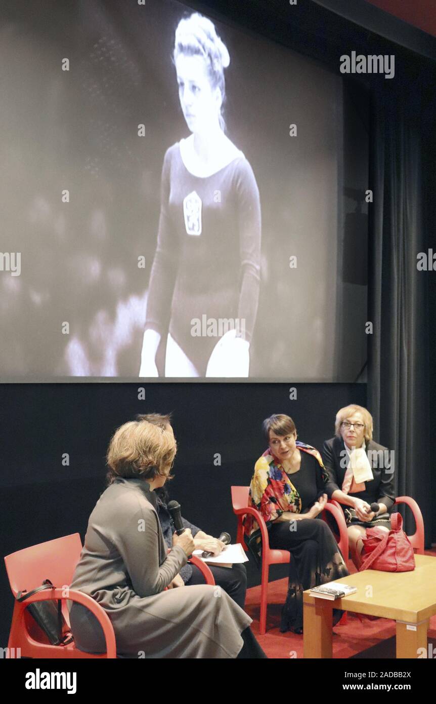 Radka Caslavska (2nd from R), daughter of Vera Caslavska, attends an