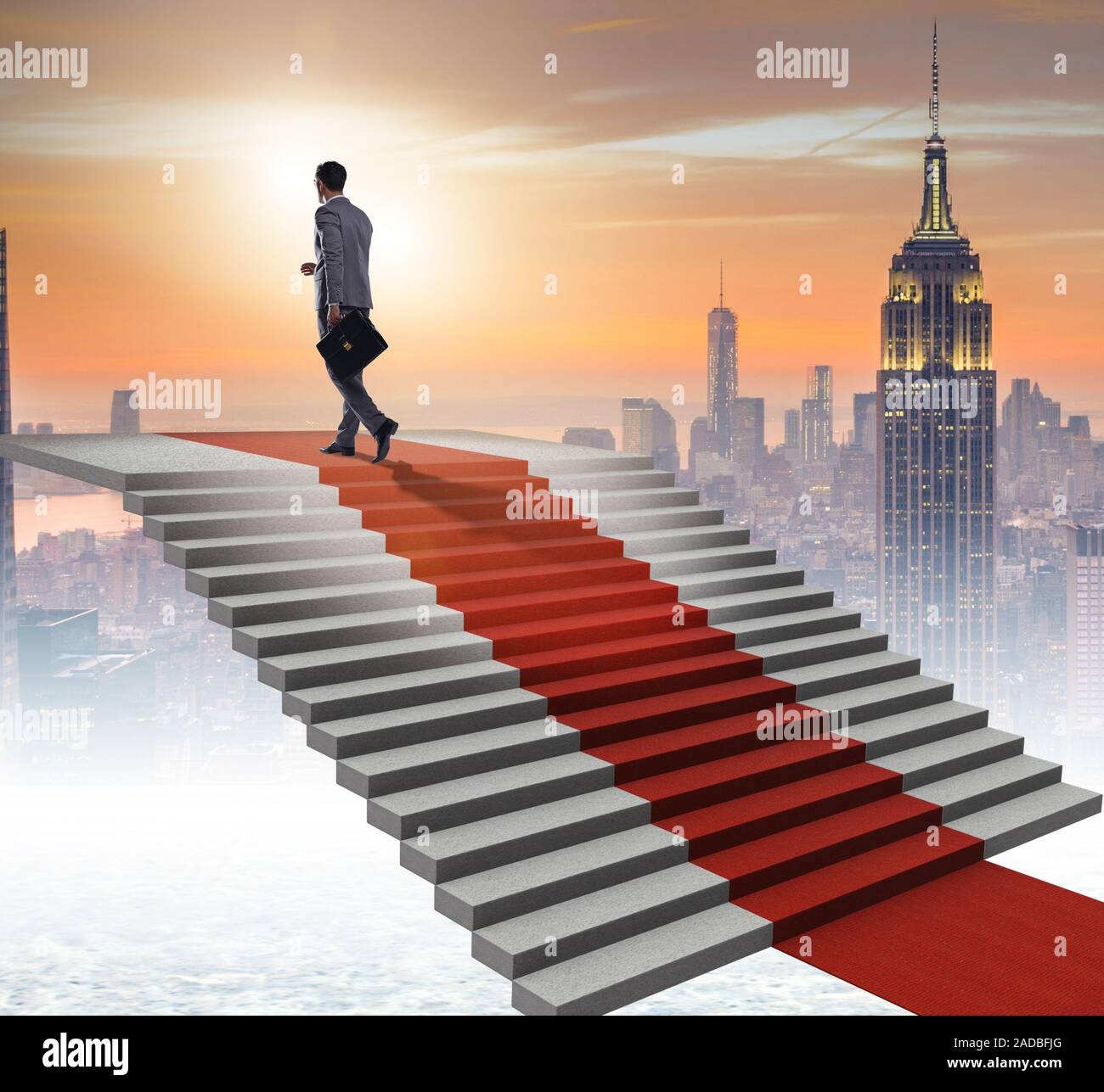 Young Businessman climbing stairs and red carpet Stock Photo - Alamy