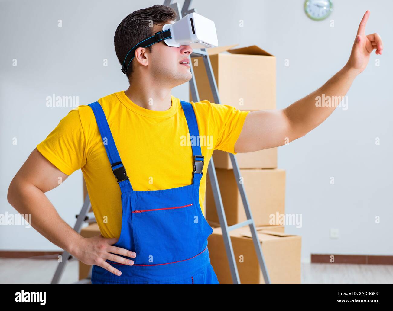 The painter contractor working with virtual reality goggles Stock Photo
