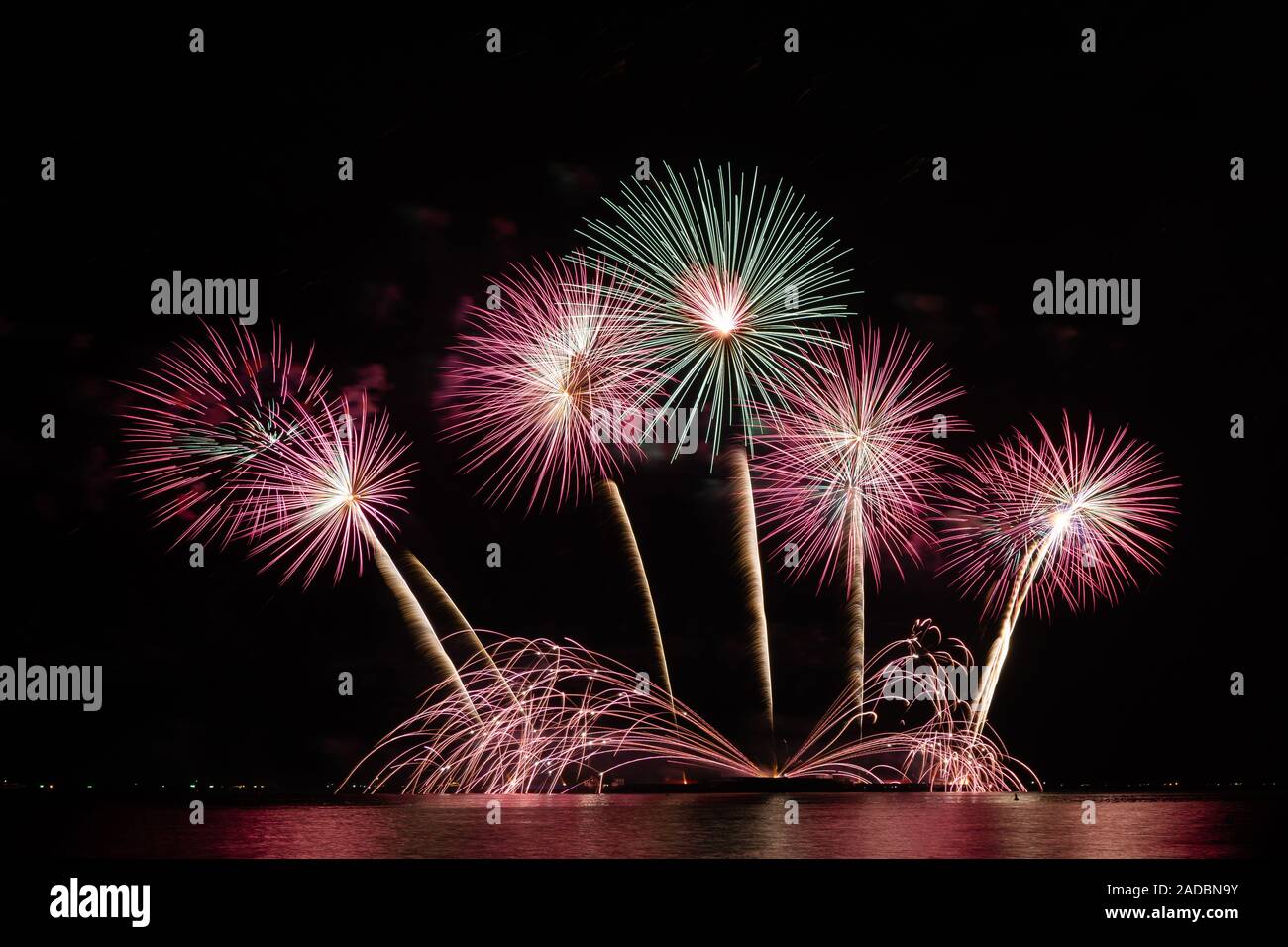 firework beautiful celebration festival colorful countdown merry christmas happy new year dark sky sparkle glowing cheerful anniversary Stock Photo