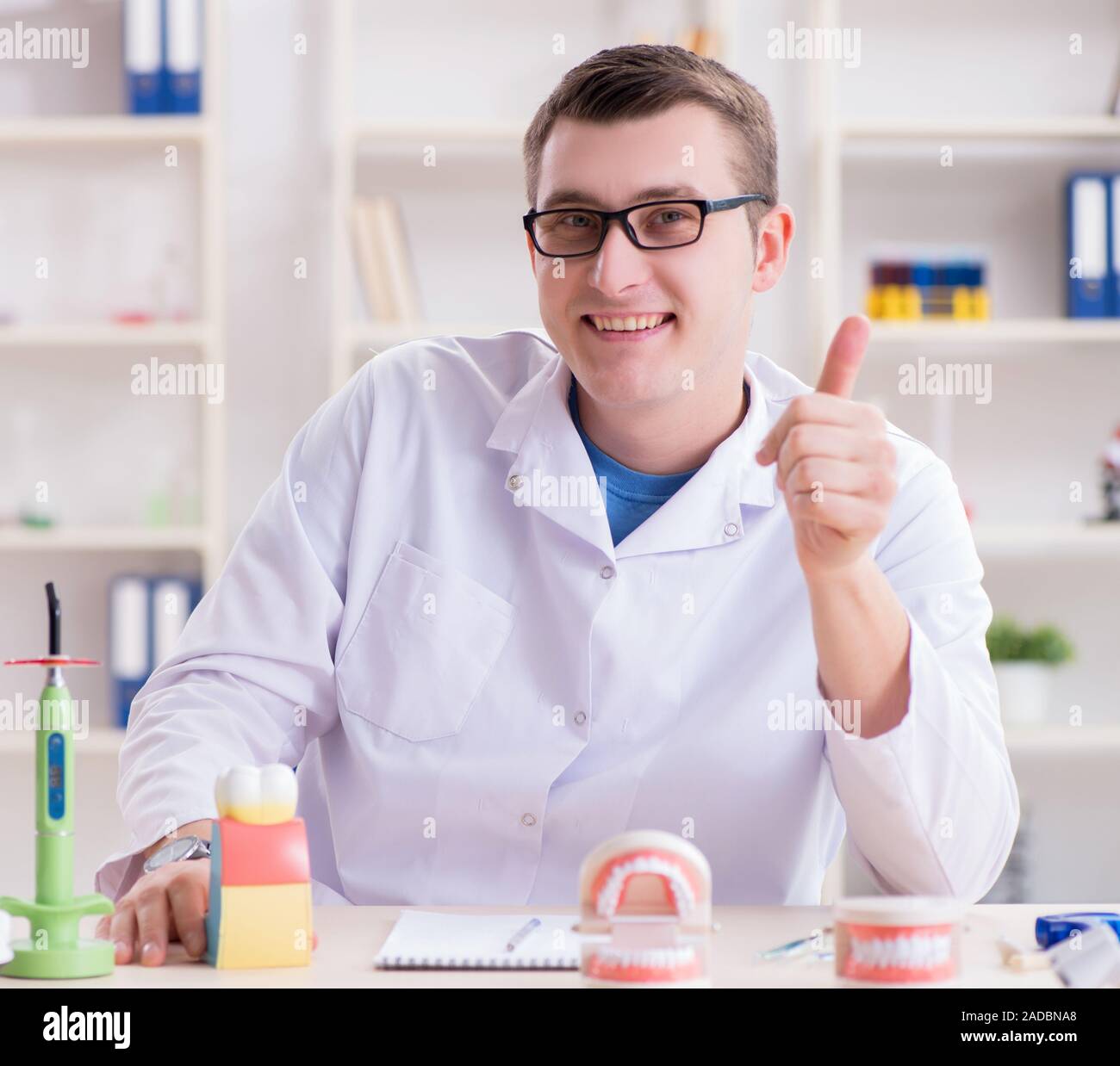 Dentist working teeth implant in medical lab Stock Photo Alamy