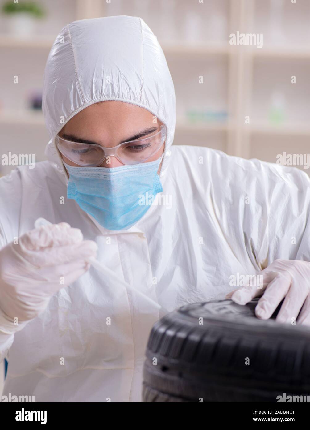 Expert is looking at car accident evidence Stock Photo Alamy