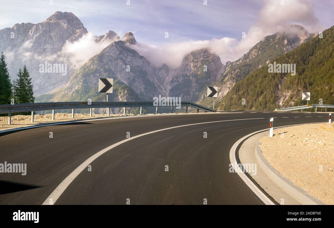 winding, asphalt road in the mountains Stock Photo