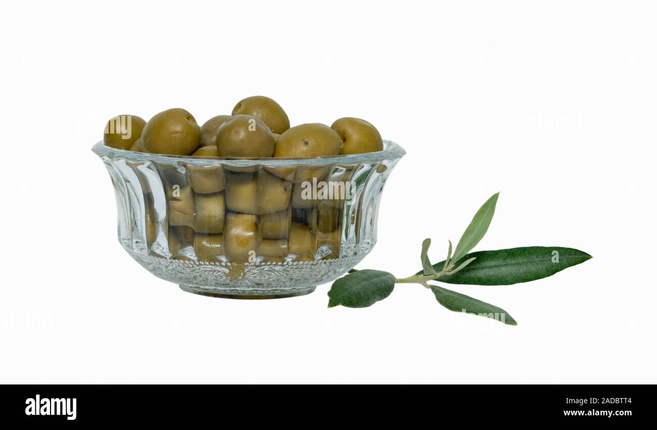 Green olives isolated on white background Stock Photo - Alamy
