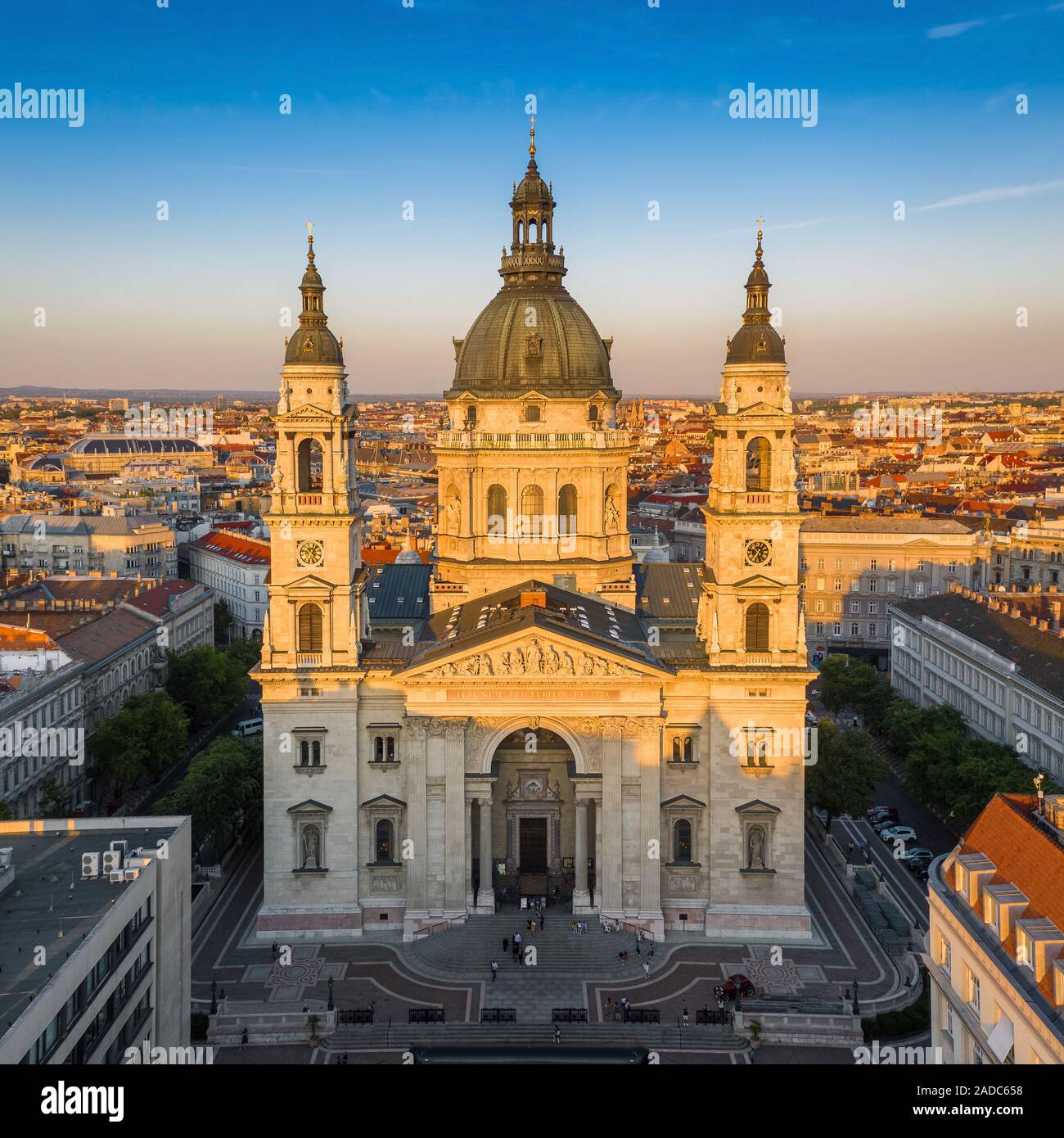 Budapest, Hungary - Aerial drone view of the beautiful St. Stephen's Basilica at sunset with warm summer afternoon lights and clear blue sky Stock Photo