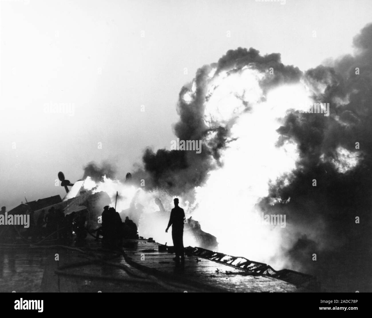 Shipboard fire in the Korean War. Flames and smoke billowing from fires ...