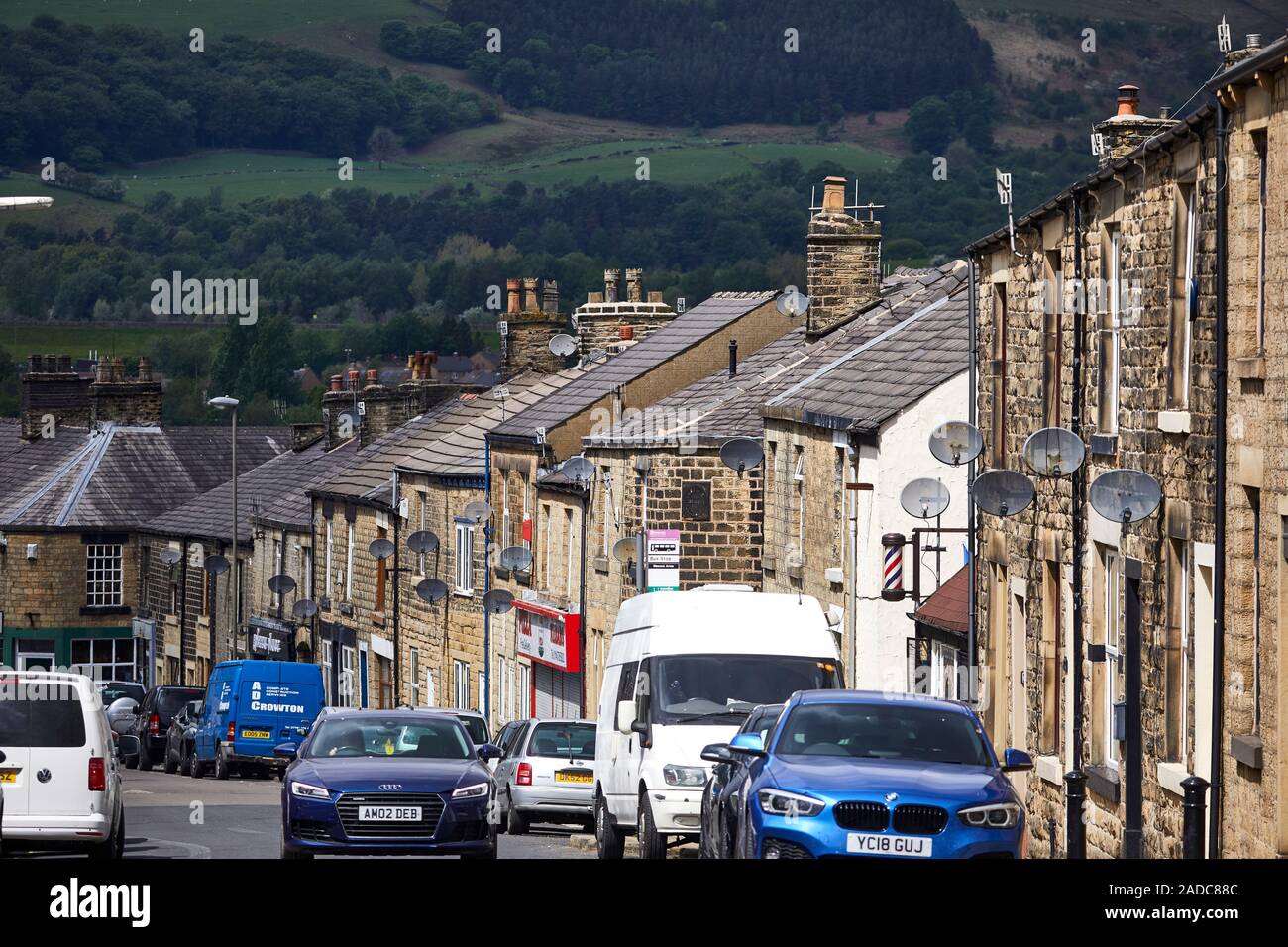 Glossop market town, the High Peak, Derbyshire, England. Hadfield village independent shops along Station Road Stock Photo