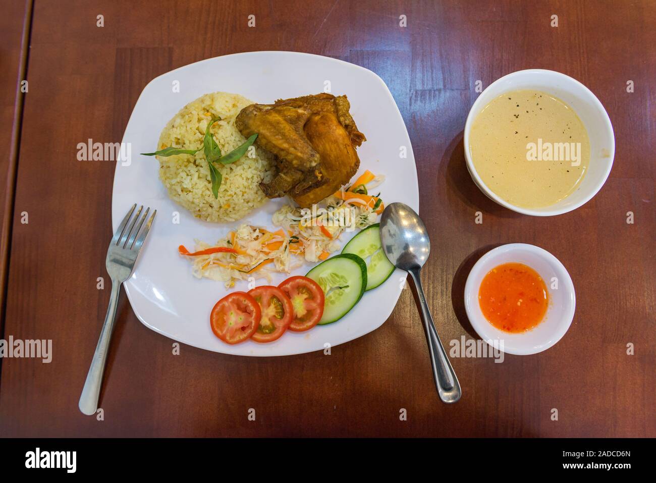 Top view photo of crispy fried chicken rice and soup Stock Photo - Alamy