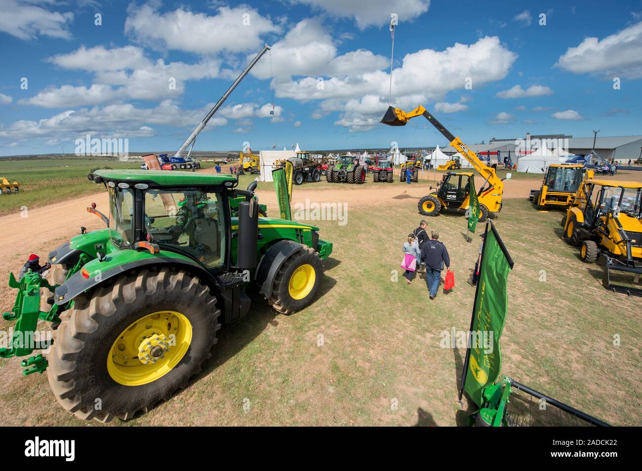 Farming equipment and implements on display at an agricultural show in