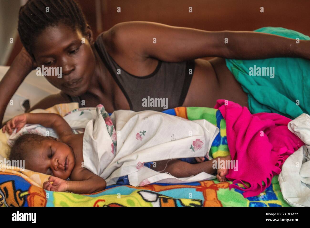Mother and sick baby in hospital. Photographed in St Mary's Hospital