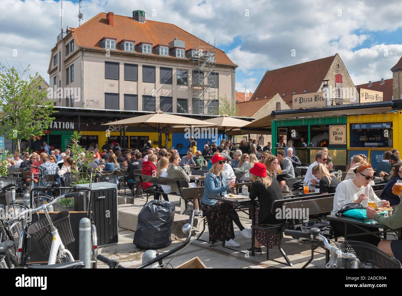 Copenhagen Street food market, view of people eating in the Street Food Market in Grønlandske Handels Plads, Christianshavn, Copenhagen, Denmark. Stock Photo