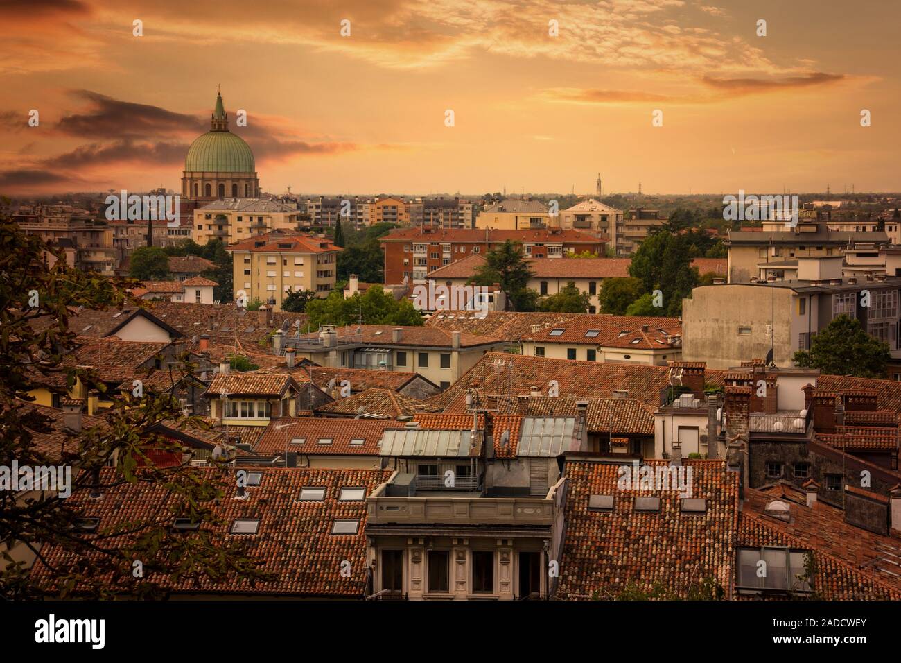 View of Udine in Italy. Summer evening with nice sunset. Stock Photo