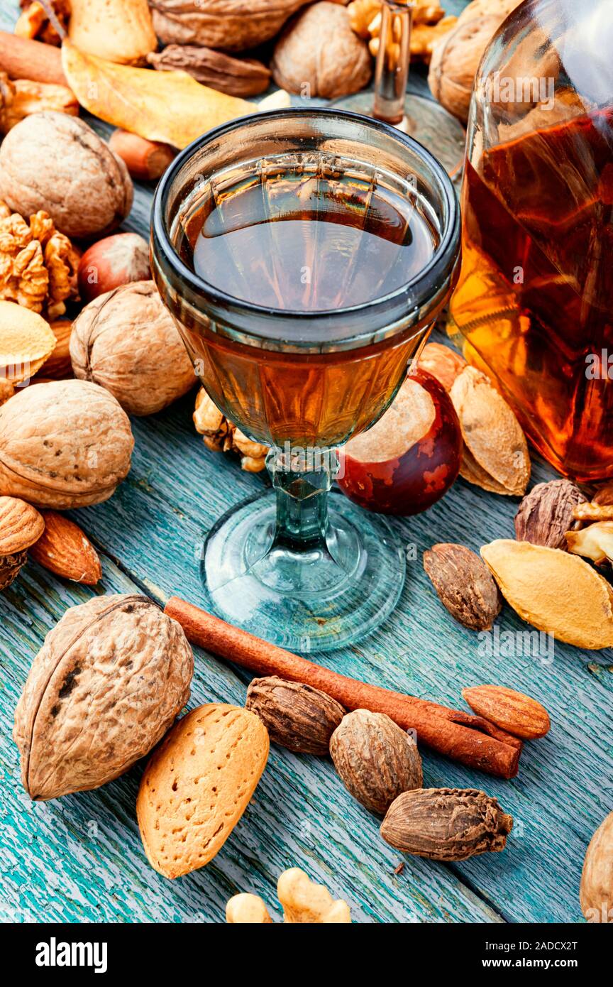 Fragrant nutty liquor tincture.Walnut liquor, sweet table alcoholic drink Stock Photo