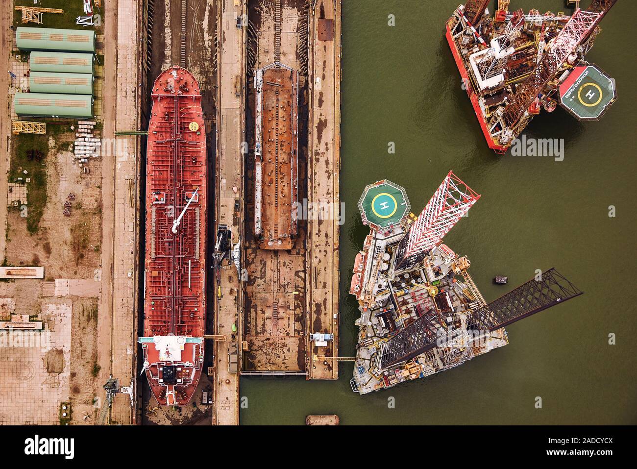 Shipyard Rigs Aerial photograph of rigs for off-shore oil drilling in an industrial ...