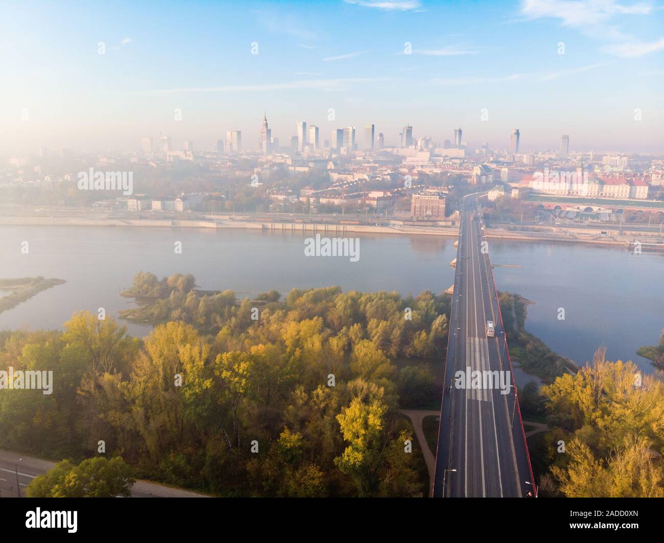 Warsaw city center, Vistula river and Slasko-Dabrowski bridge at dawn aerial view Stock Photo