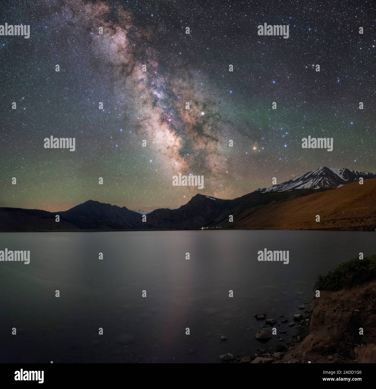 Milky Way over lake. View over a lake towards the Milky Way in the ...