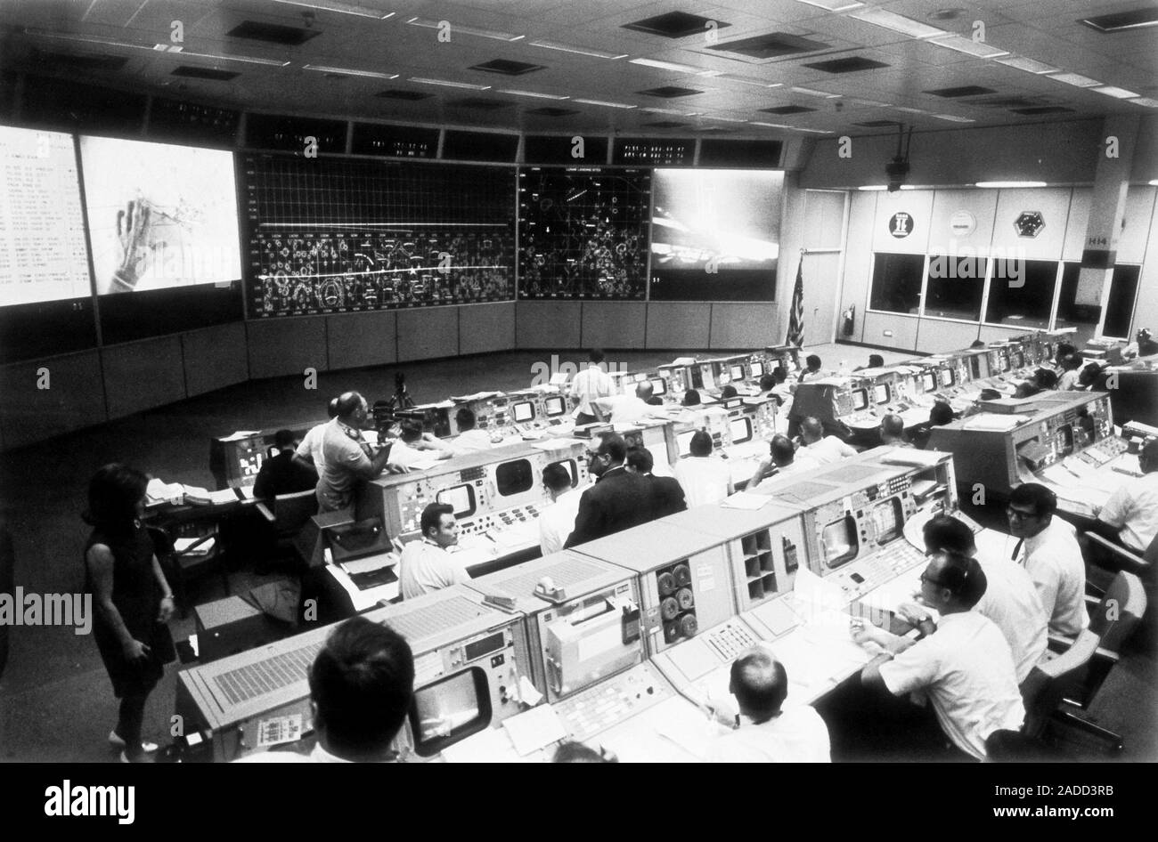 Mission control during Apollo 11 surface EVA, 1969. Controllers in the ...