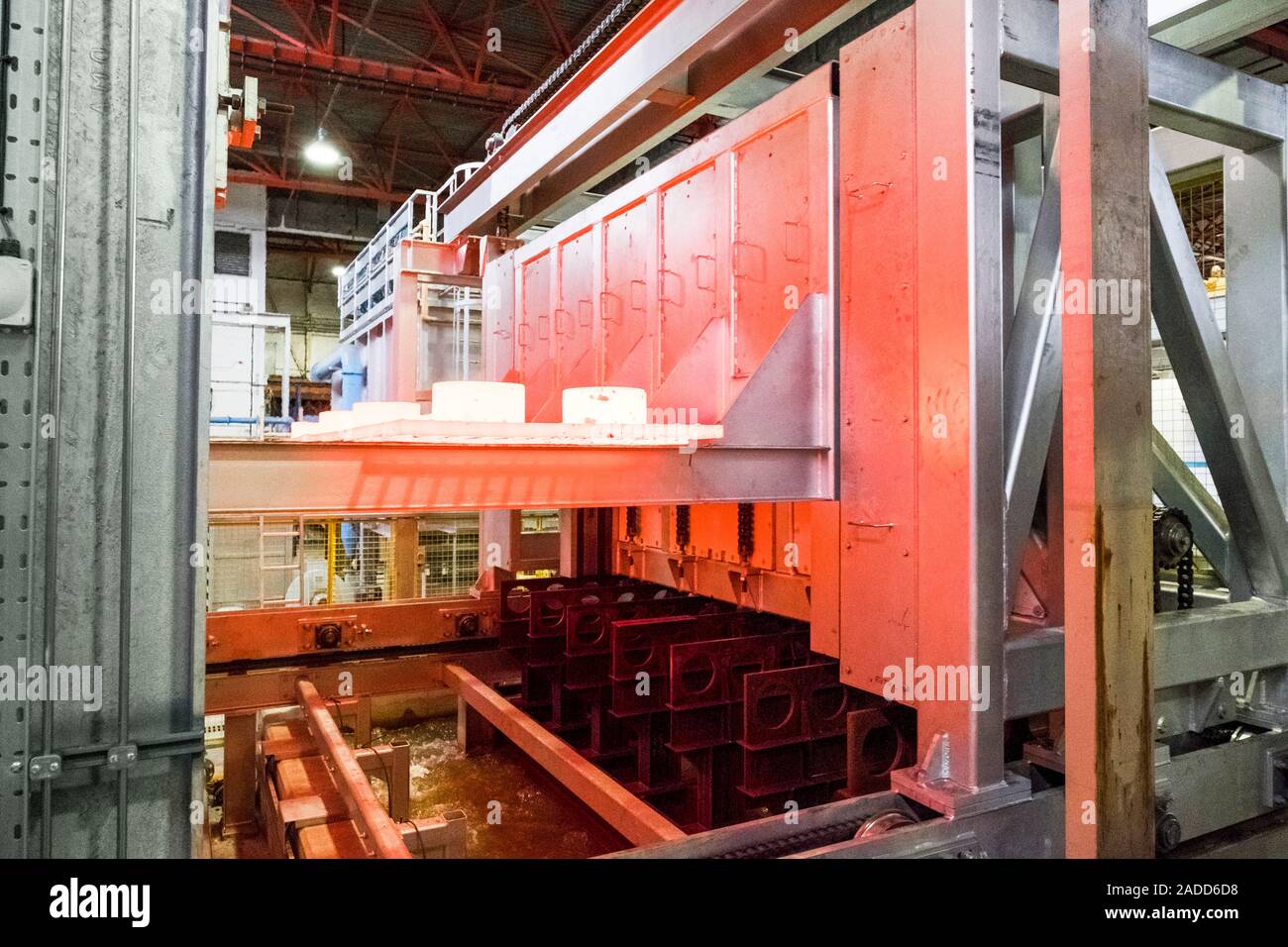 Metalworks. Batch furnace and water quench tank at a metalworks. This