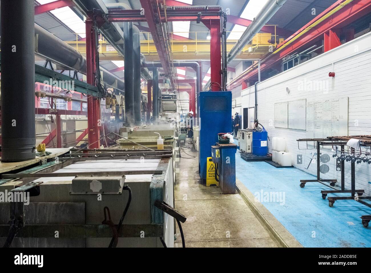 Electroless nickel plating factory. Nickel plating chemical tanks and