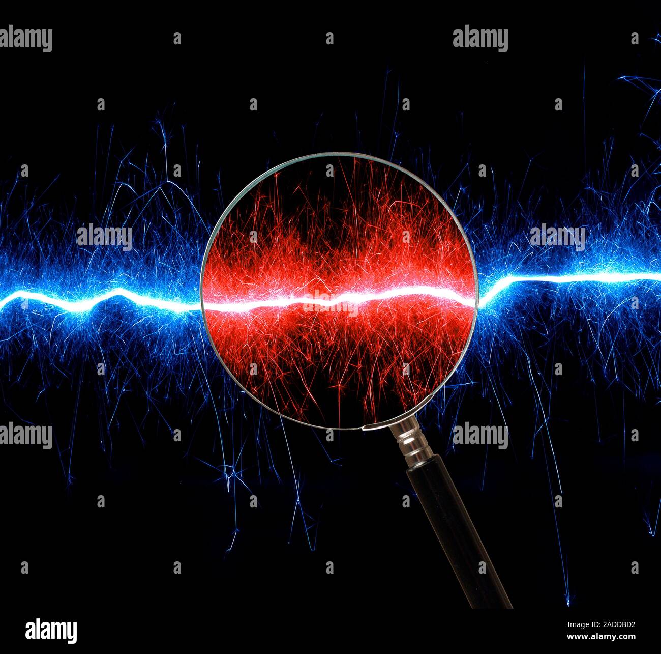 Electricity research. Conceptual image of a magnifying glass and