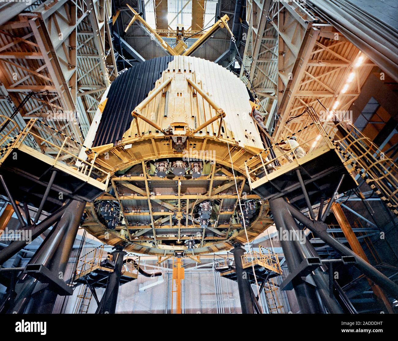 Saturn V first stage vertical assembly, 1967. Positioning of the thrust