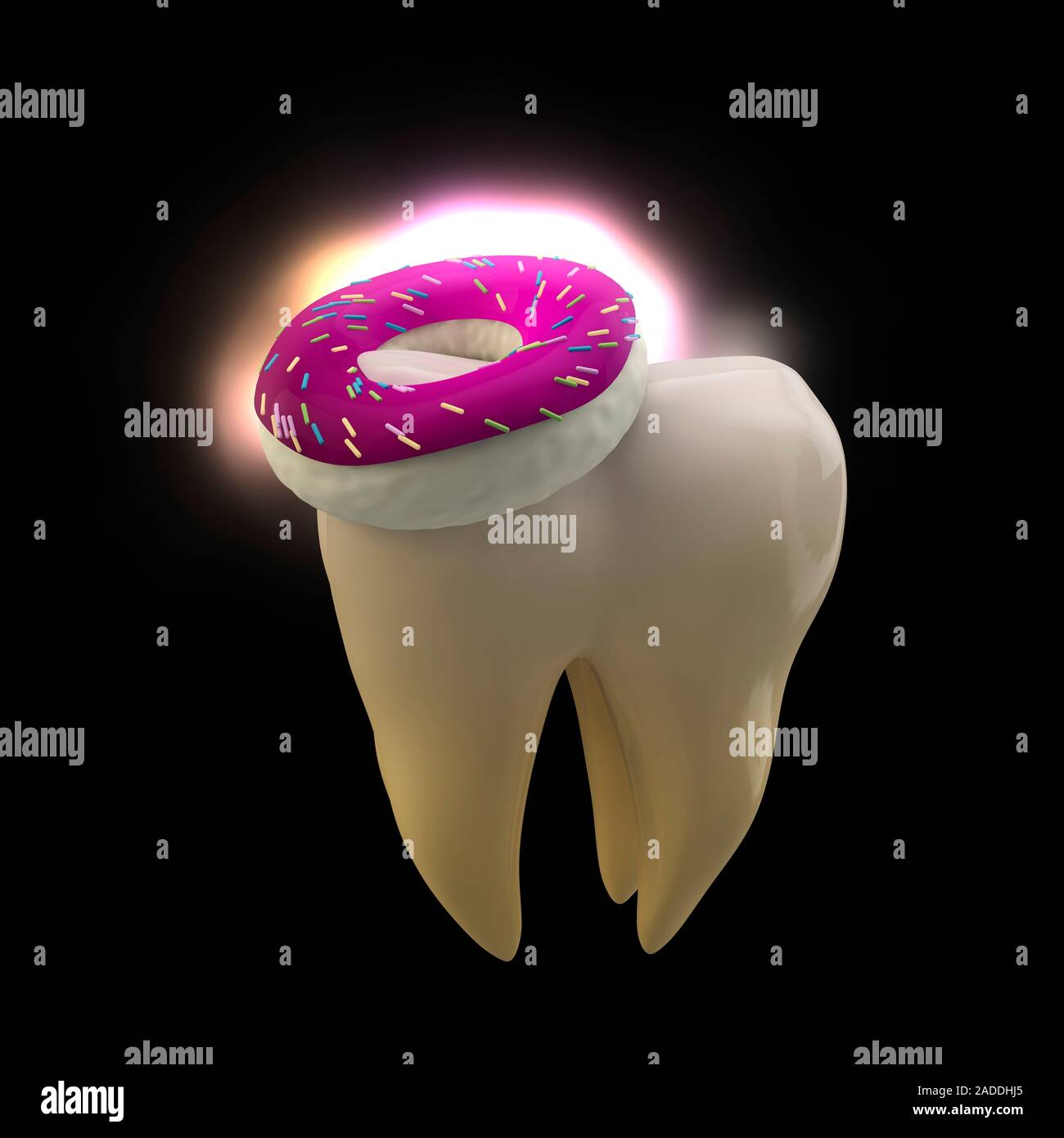 Tooth and doughnut, conceptual image. The sugar in food such as