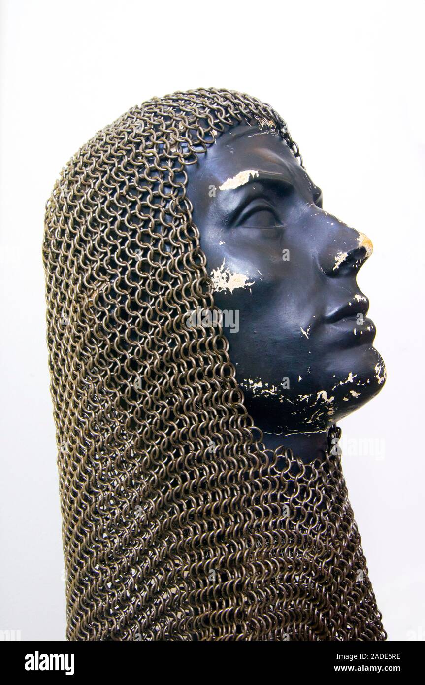 Chain mail on a dummy head isolated on a white background. Chain mail