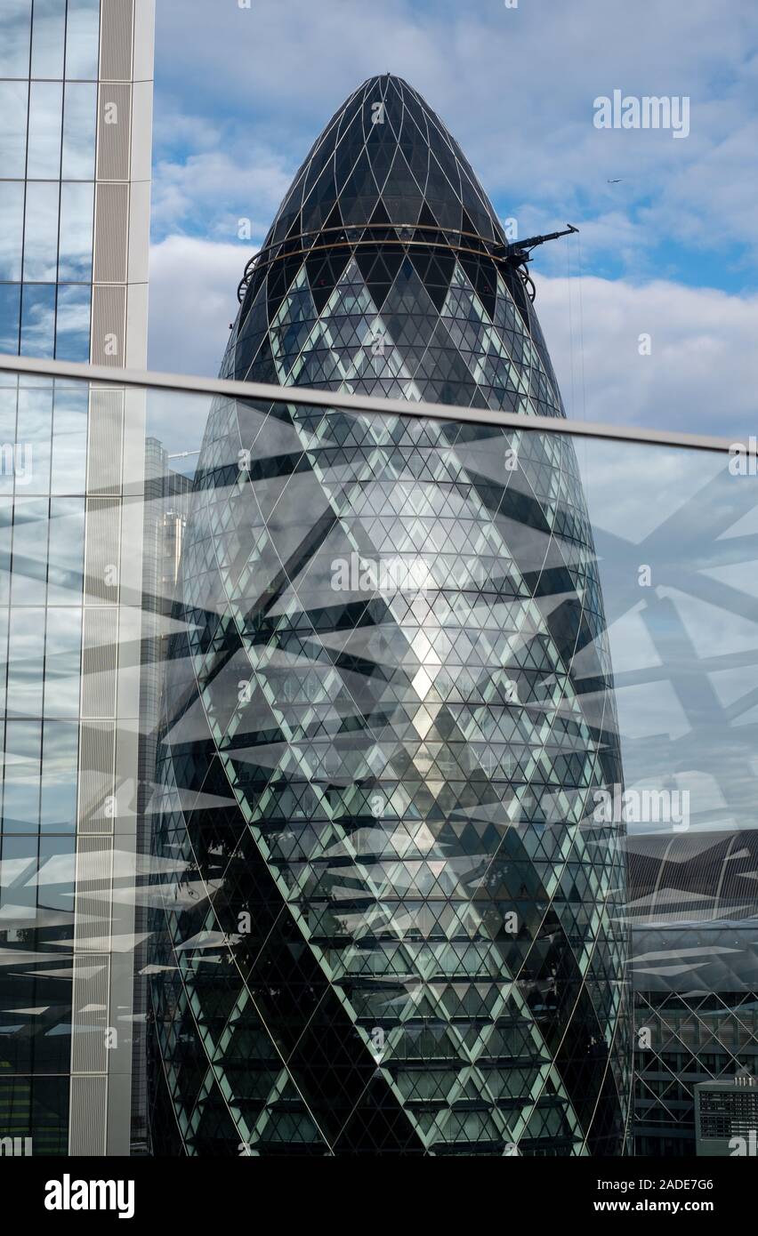 Iconic Gherkin Building, 30 St Mary Axe in the City of London financial district. Photographed from The Garden at 120 Fenchurch St. Stock Photo