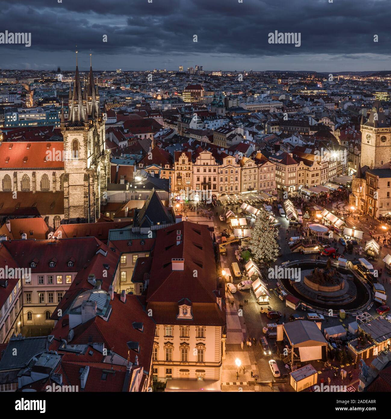 Prague, Czech Republic - Aerial panoramic drone view of the famous Christmas market of city Prague at the Old Town Square with illuminated Church of o Stock Photo