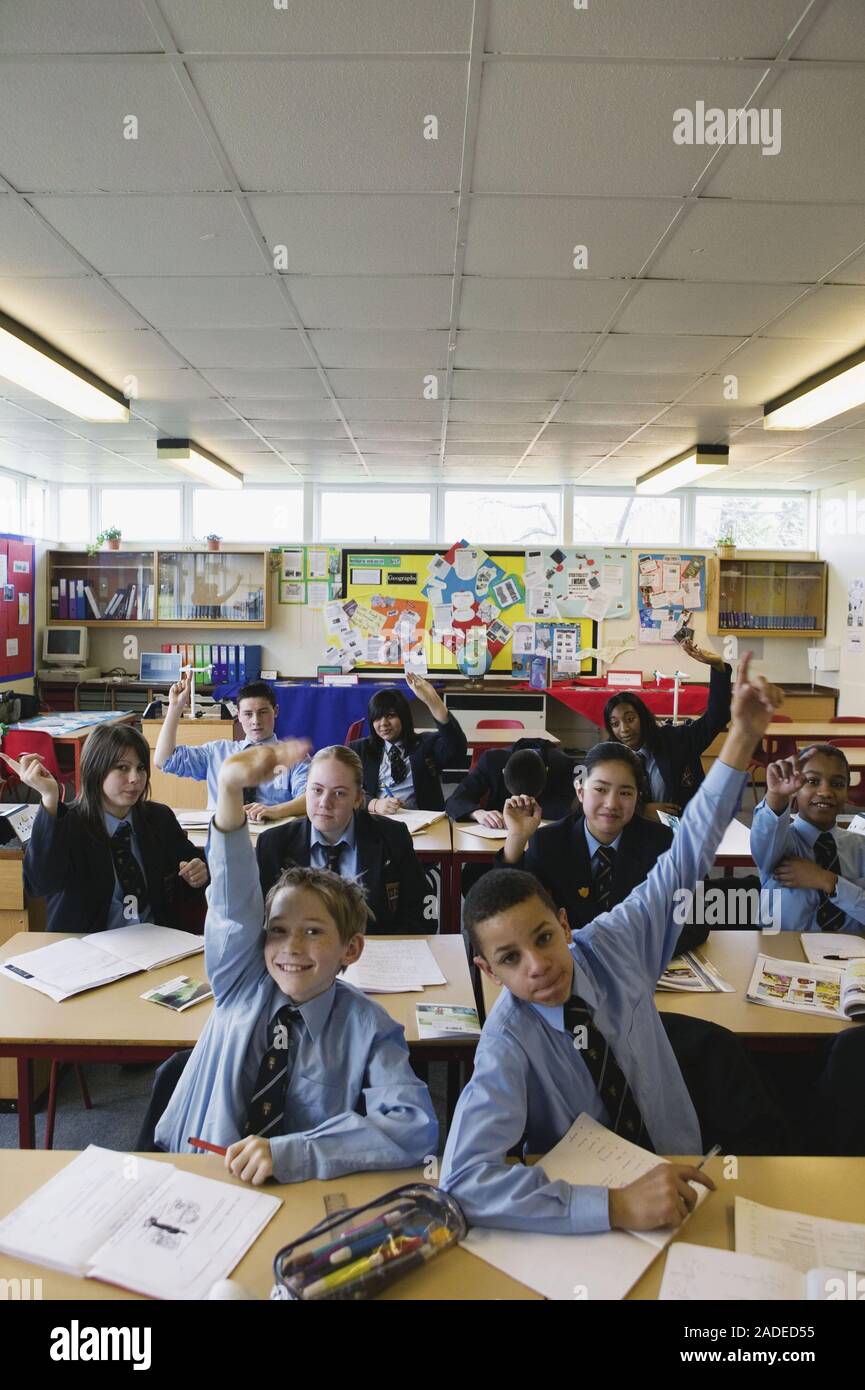 Enthusiastic classroom of secondary school children Stock Photo - Alamy