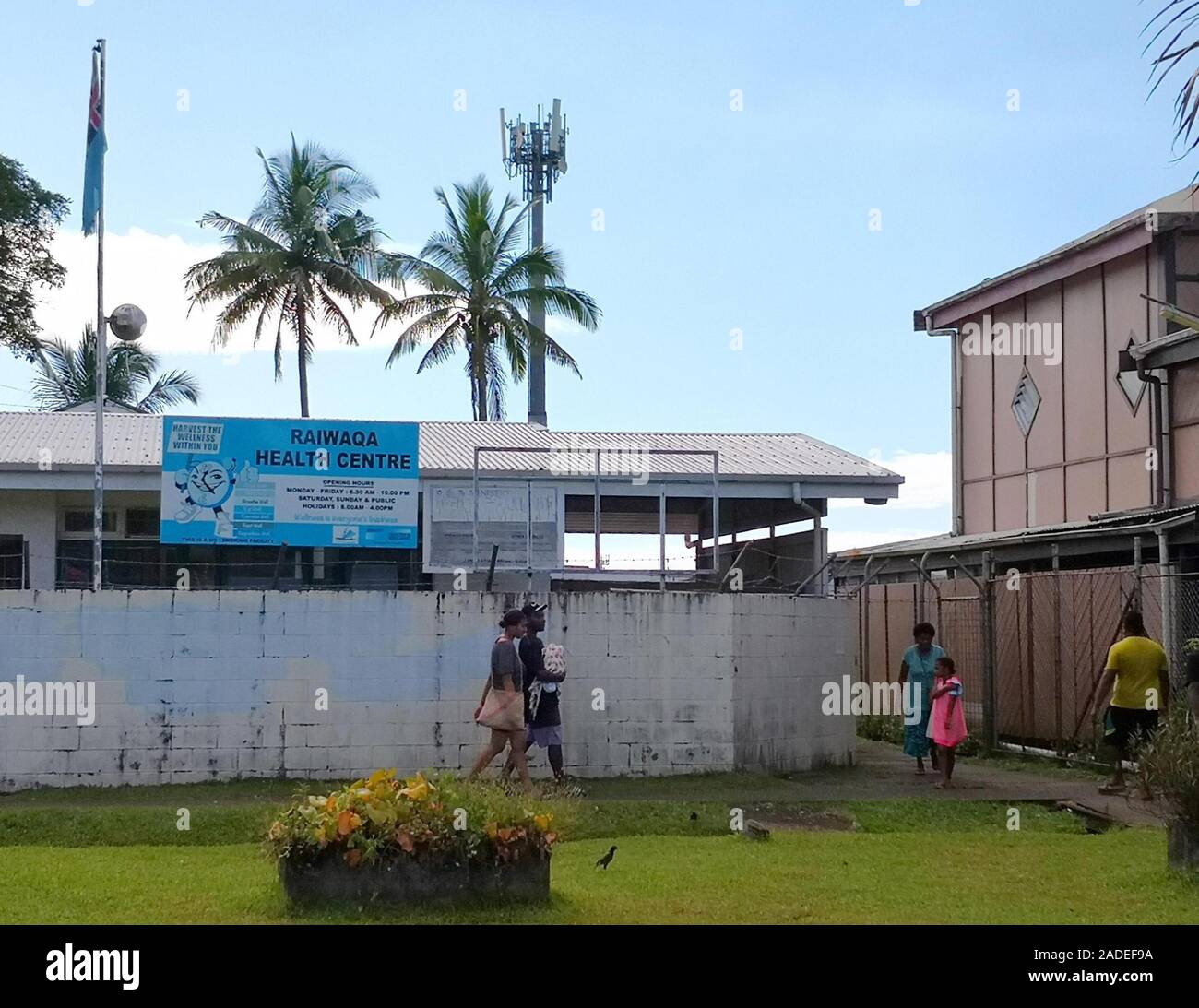 Suva, Fiji. 4th Dec, 2019. Residents go to Raiwaqa health center to receive measles vaccine in Suva, Fiji, Dec. 4, 2019. The second phase of the measles immunization campaign began on Wednesday in Fiji's capital Suva. The immunization campaign targets children who have not received two doses of the measles vaccine, any child aged 12 and 18 months who is due for immunization, people travelling overseas, healthcare workers, and airport and hotel staff around the country. There are 15 confirmed measles cases in Fiji by Tuesday. Credit: Zhang Yongxing/Xinhua/Alamy Live News Stock Photo