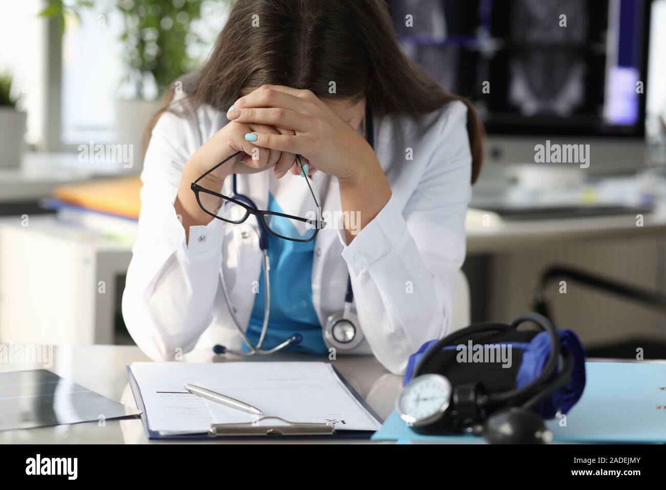 Upset doctor at hospital office Stock Photo