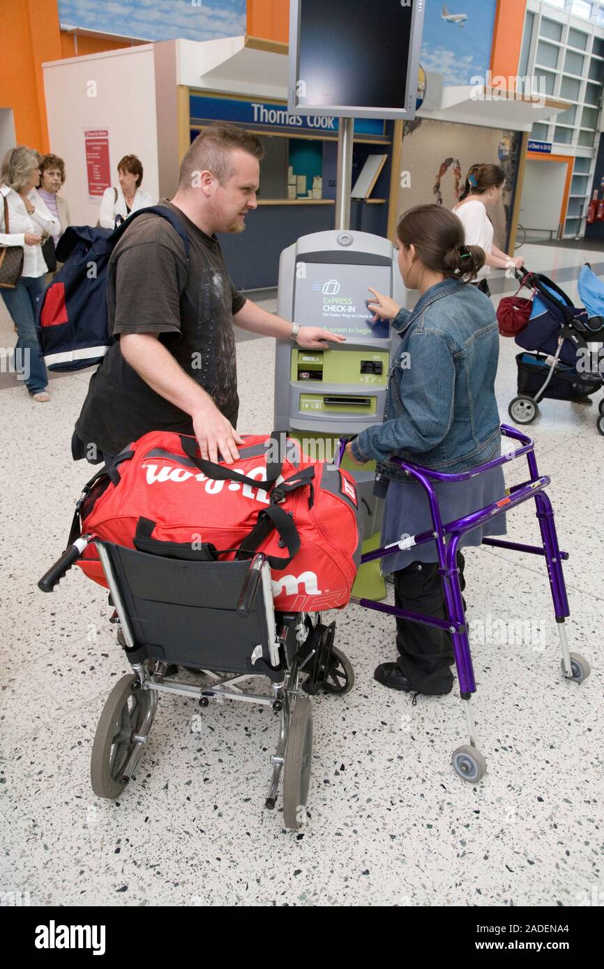 Couple Using The Express Check in At Airport Stock Photo Alamy couple-using-the-express-check-in-at-airport-stock-photo-alamy