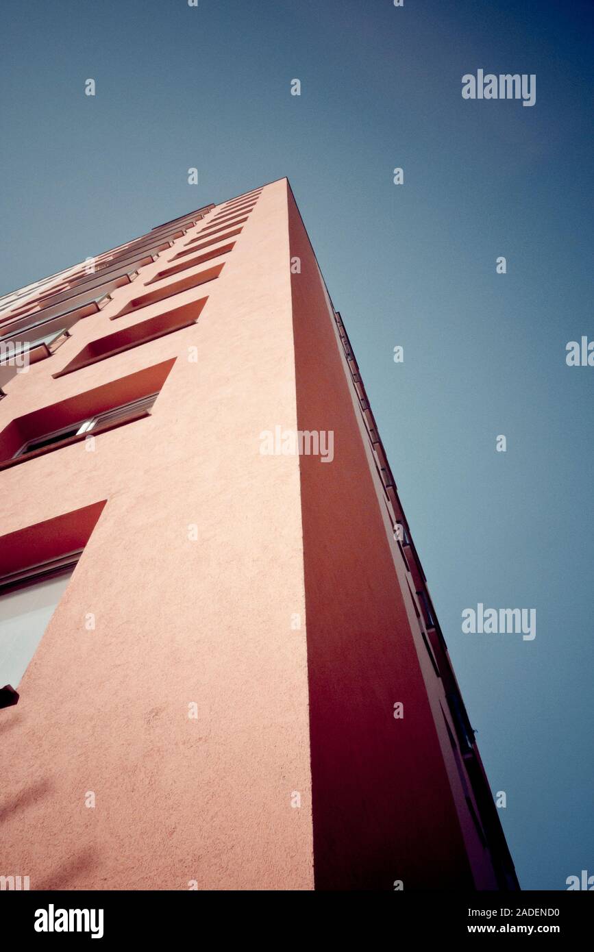 slanted angle of a modern red multistorey building Stock Photo Alamy