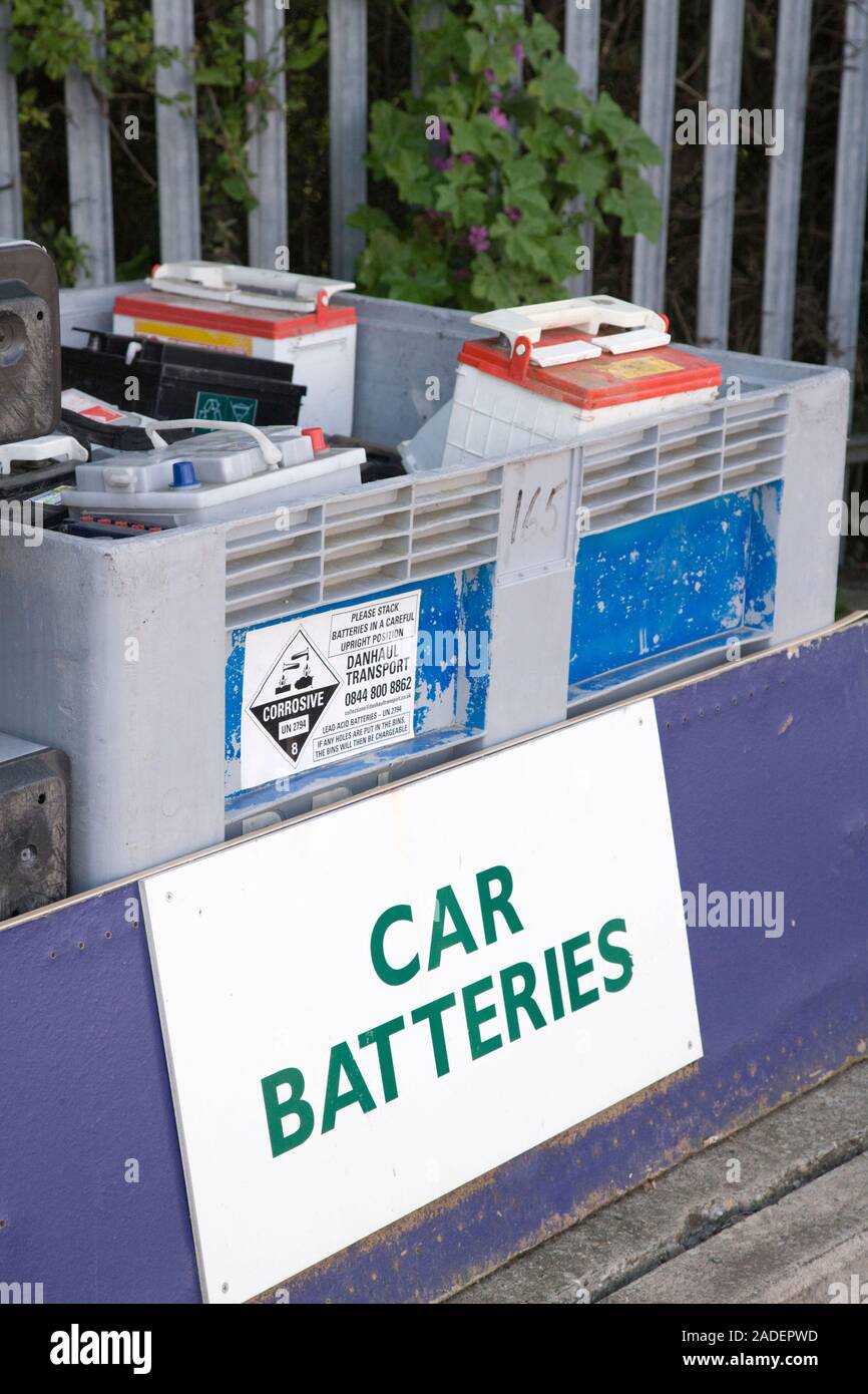 Old car batteries in bin at city tip Stock Photo Alamy