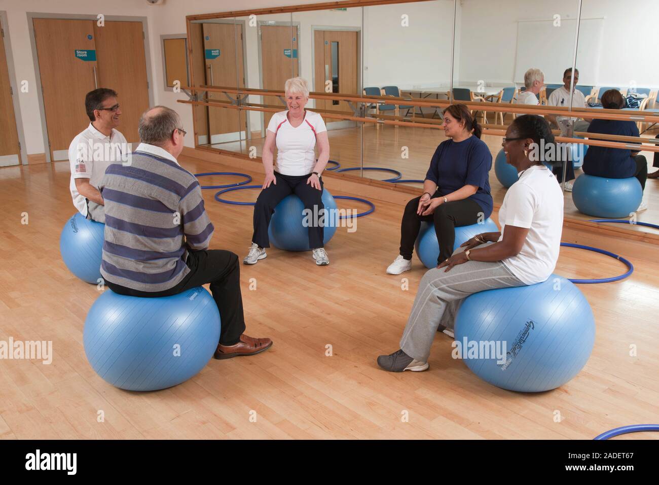 Older people doing exercise class Stock Photo - Alamy