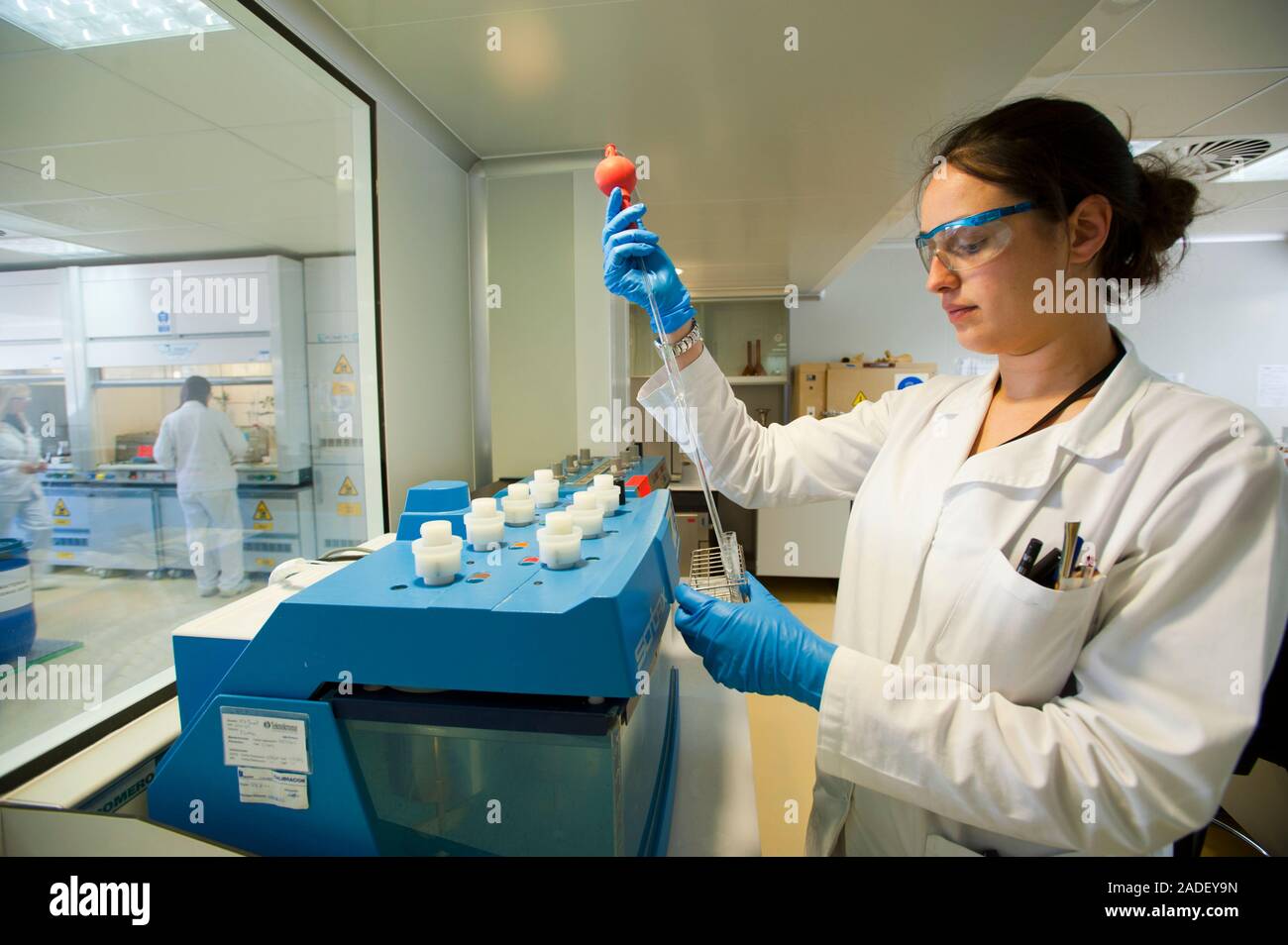 Teva Samples Pharmaceutical research. Researcher pipetting samples for analysis ...