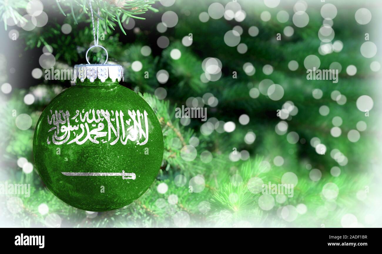 Christmas and New Year background with a flag of Saudi Arabia Stock