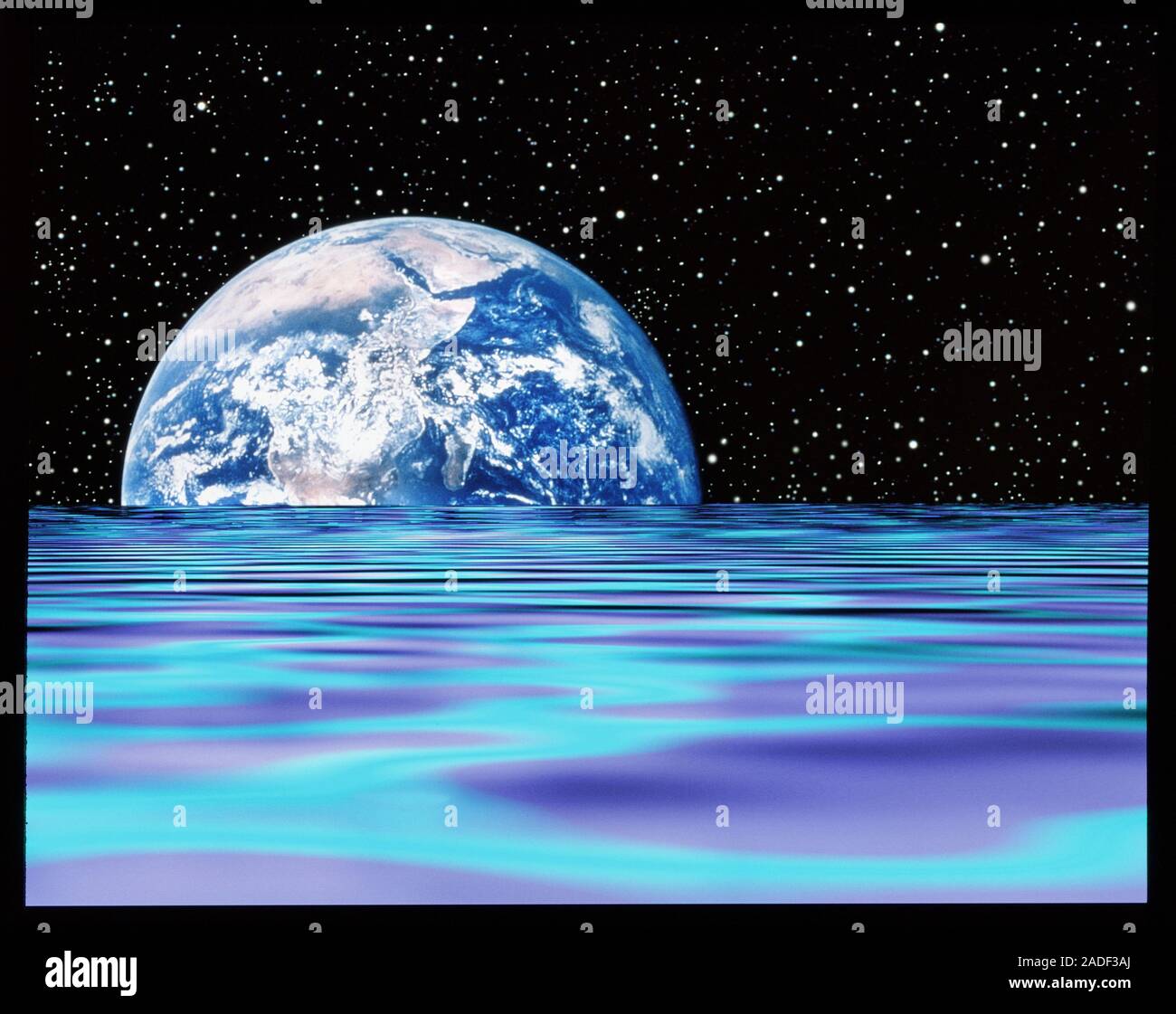 Earth rise over water. Abstract computer image of the Earth seen on a ...
