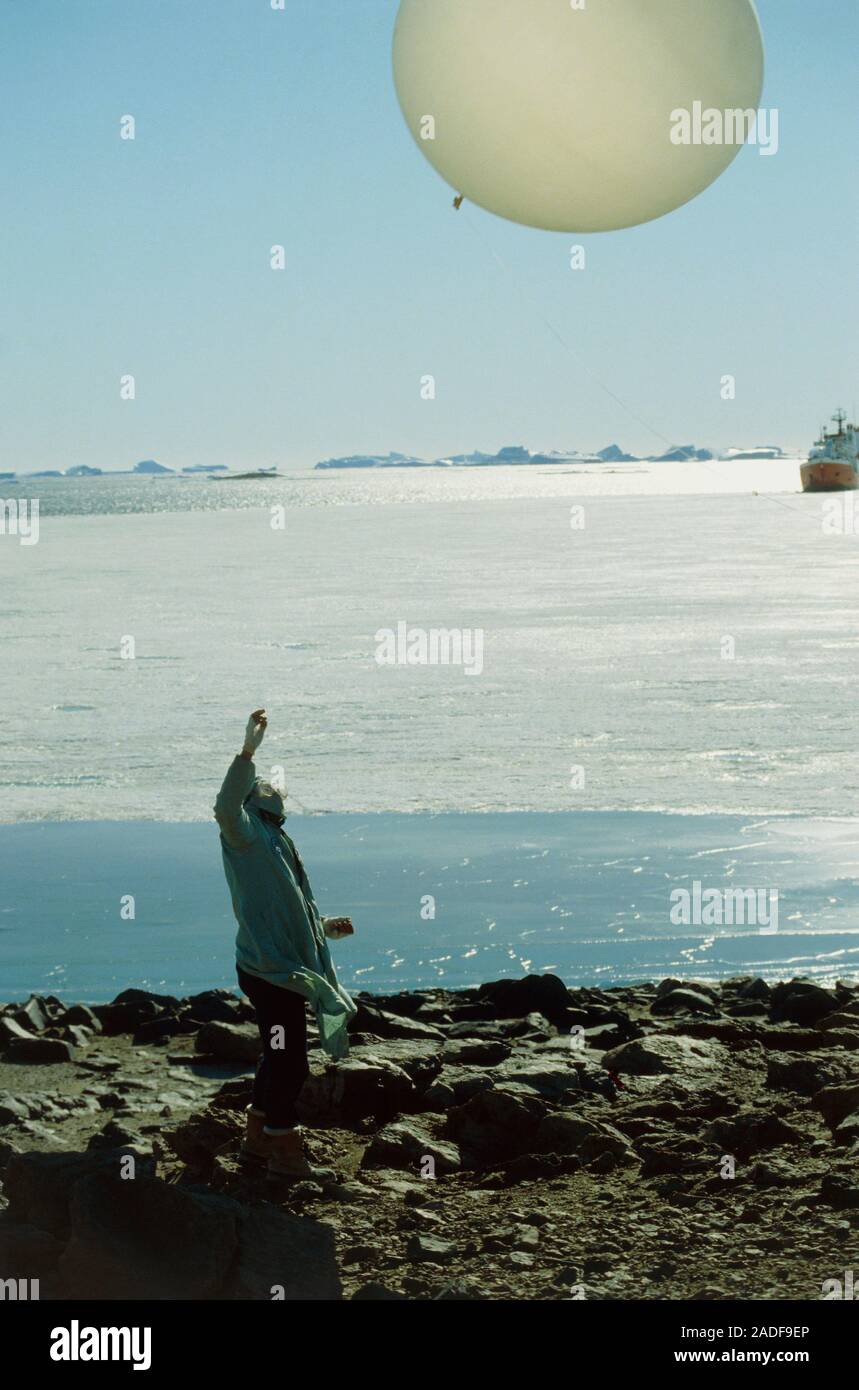 Weather balloon launch. Researcher launching a radiosonde weather
