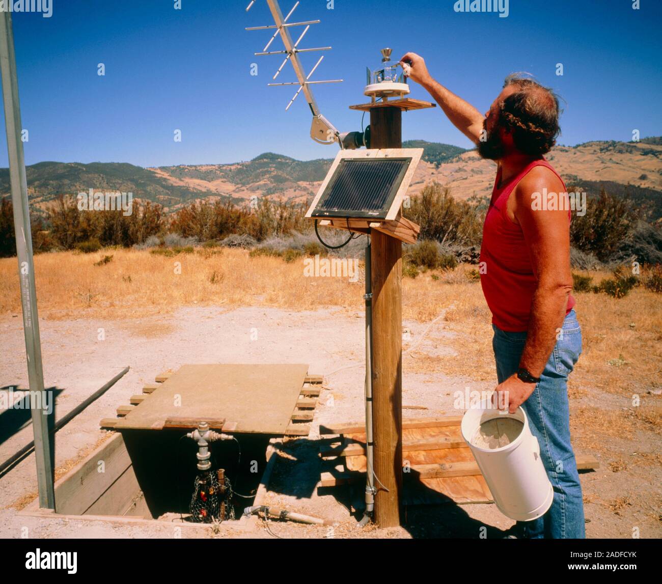 Parkfield earthquake prediction experiment. A U.S. Geological Survey field technician checks on