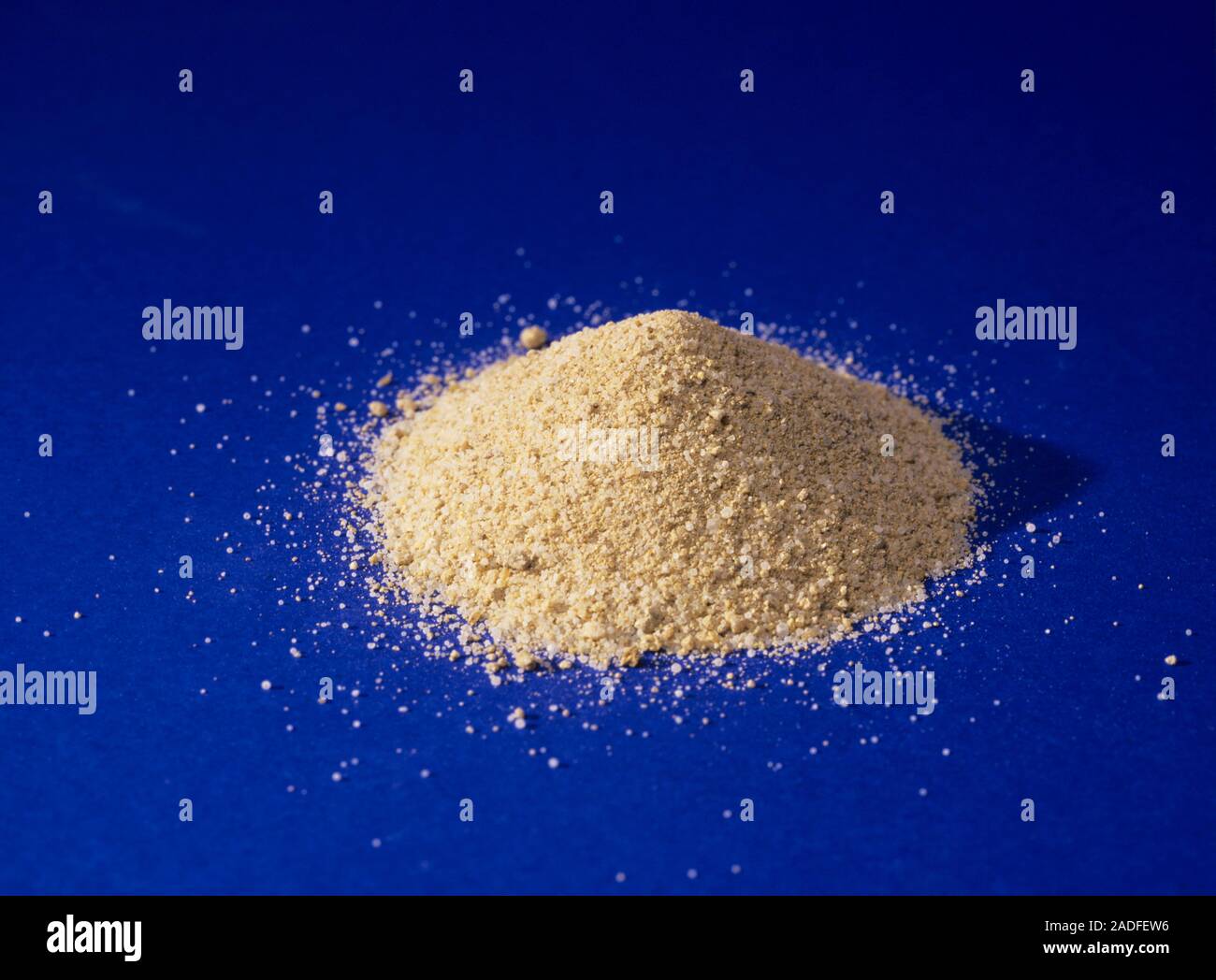 Pile of sand. Sand is composed largely of the mineral quartz, and has ...